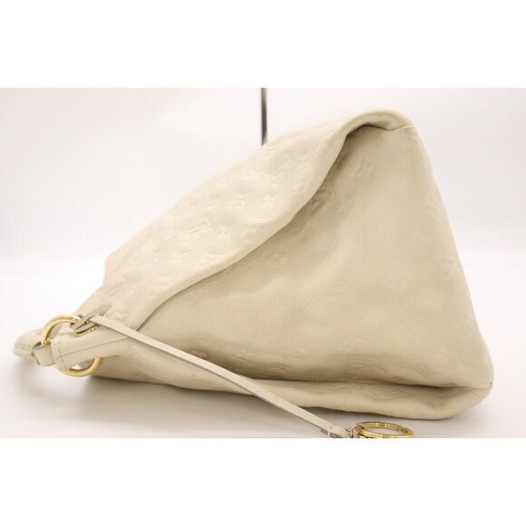 Gorgeous Louis Vuitton Artsy MM Monogram Empreinte Leather Tote in Ivory - Picture 5 of 10